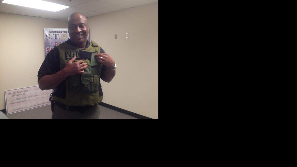 
Chester County Sheriff Alex Underwood wears the bulletproof vest that saved his life when he was shot a decade ago while serving as a SLED agent. Twenty new vests will be bought for deputies thanks to $18,000 in donations to the sheriff’s office.

