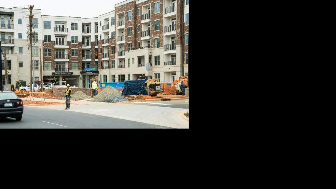 
Camden Southend apartments are shown under construction on March 19, 2015 on South Boulevard next  to a Publix grocery store in Charlotte. The finishing touches are being put on Publix, and other nearby buildings that will house retail. Publix is expected to open by early April. 
