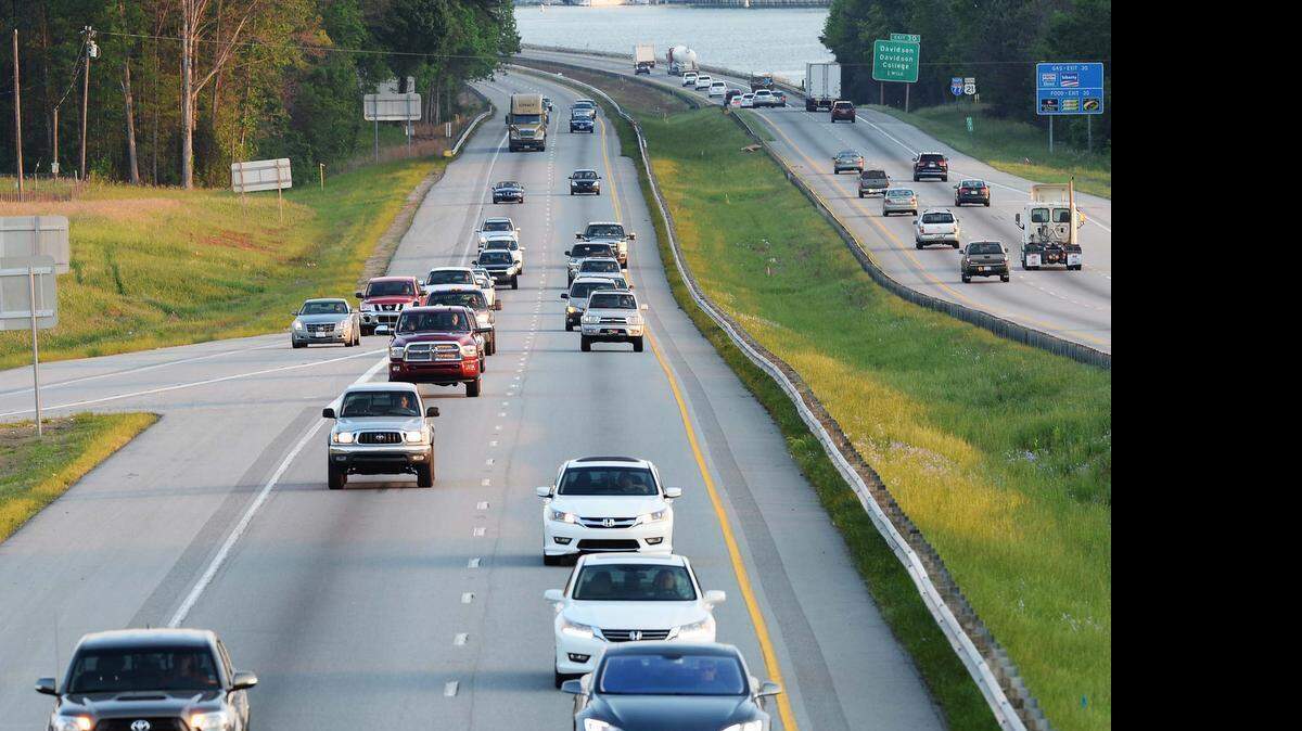
Afternoon traffic travels along the south bound lanes on I-77 near Exit 31 in Mooresville on May 4,2015.
