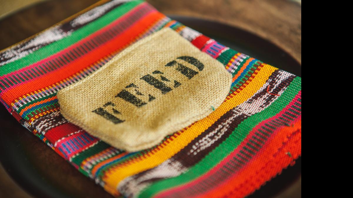 
FEED project burlap bags and bracelets were given out to each attendee during the 2015 Visionary Women Luncheon at the Mint Museum Uptown on Monday. Lauren Bush Lauren, founder and CEO of FEED, was the keynote speaker at the event hosted by Queens University of Charlotte in partnership with Wells Fargo Private Bank and the Mint Museum. 
