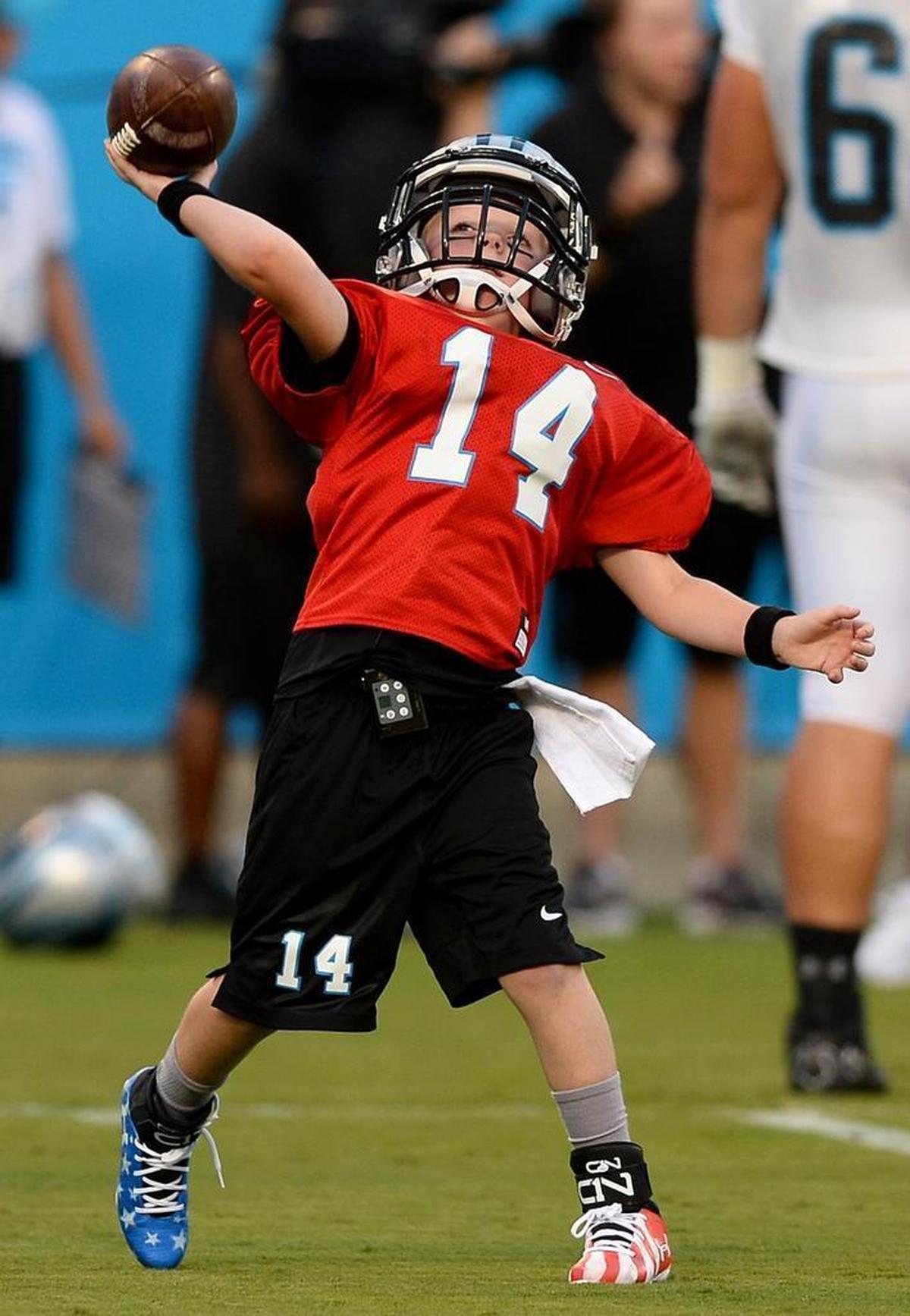 Joining the Carolina Panthers during Friday’s Fan Fest at Bank of America Stadium was Domanic "Dom" Fuller, 8. Fuller was signed to a one-day contract via the Make-A-Wish Foundation.