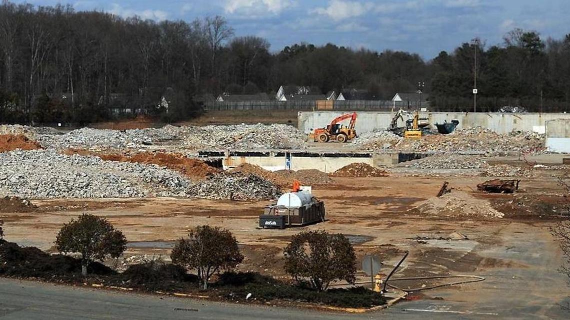 Workers continued to demolish Eastland Mall in east Charlotte in February 2014. The city hopes to sell 12 acres of the former mall site to Charlotte-Mecklenburg Schools as part of a plan to turn the area into a mixed-use neighborhood with a community park and retail.