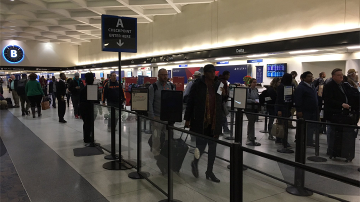 Lines at Charlotte Douglas International Airport early Monday.