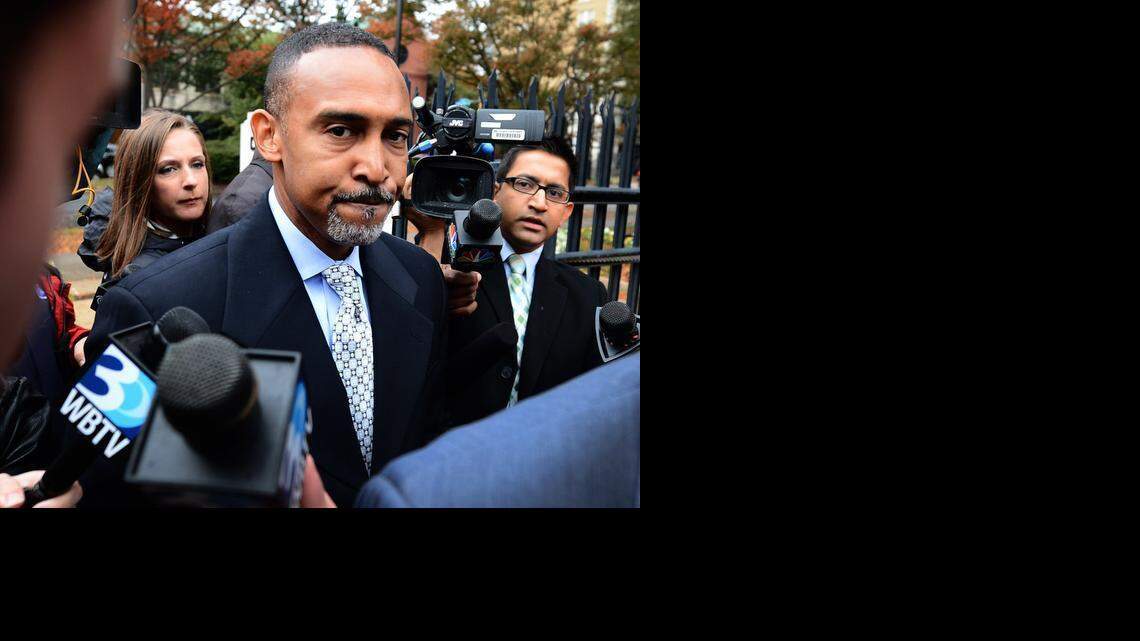 
Former Charlotte Mayor Patrick Cannon, center, surrounded by the media, arrives at the federal courthouse Nov. 6, 2014. Four pieces of FBI surveillance video show Cannon accepting money from undercover federal agents, WBTV said.



