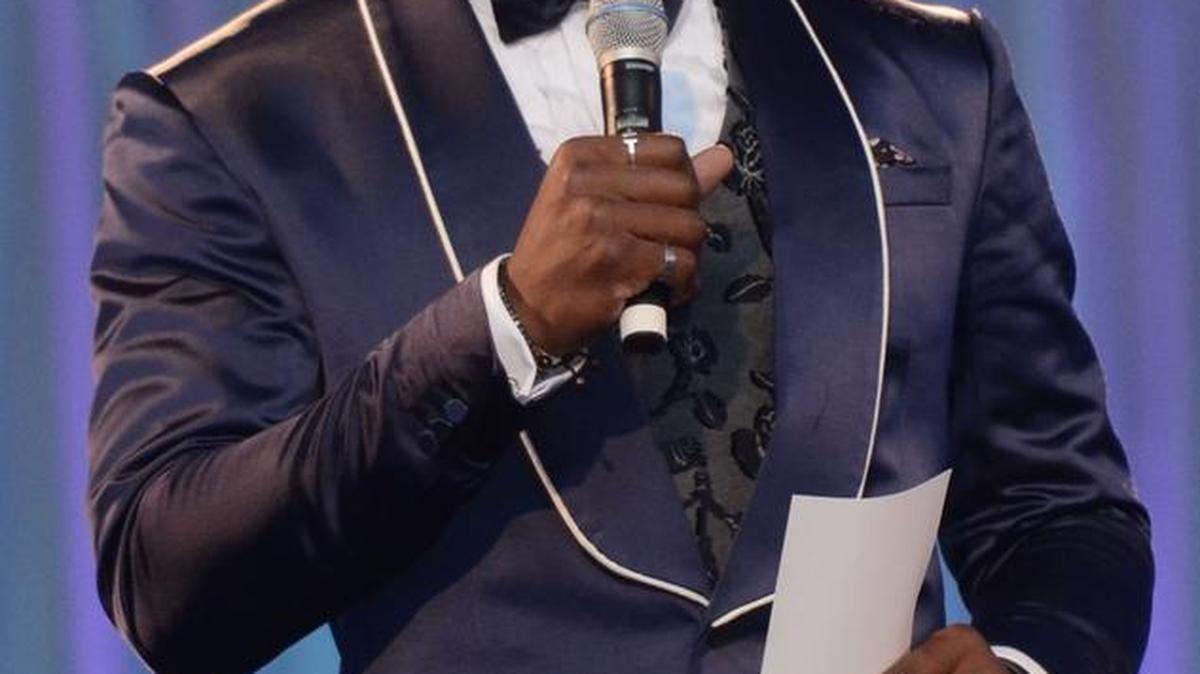 Carolina Panthers quarterback Cam Newton addresses the crowd during his foundation’s ‘Kids Rock’ gala at the Charlotte Convention Center on June 10. Newton’s foundation assists struggling families and underprivileged kids in the area.