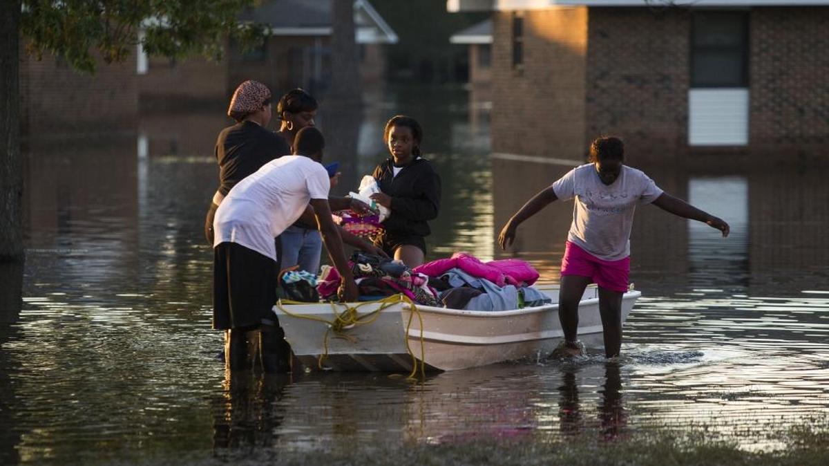 Residents who can get to their homes are trying to salvage whatever they can. Most fled the floodwaters with next to nothing.