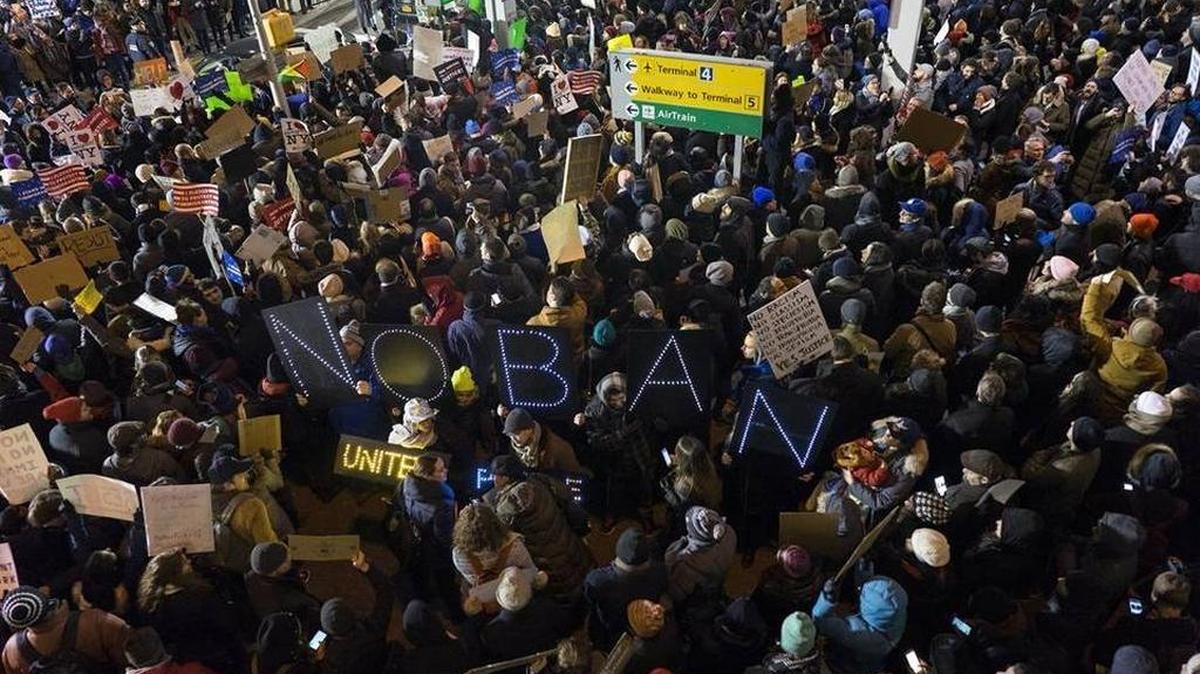 Protesters assemble at John F. Kennedy International Airport in New York on Saturday, after Iraqi refugees were detained. President Donald Trump’s executive order suspended all immigration from Iraq, Syria, Iran, Sudan, Libya, Somalia and Yemen.