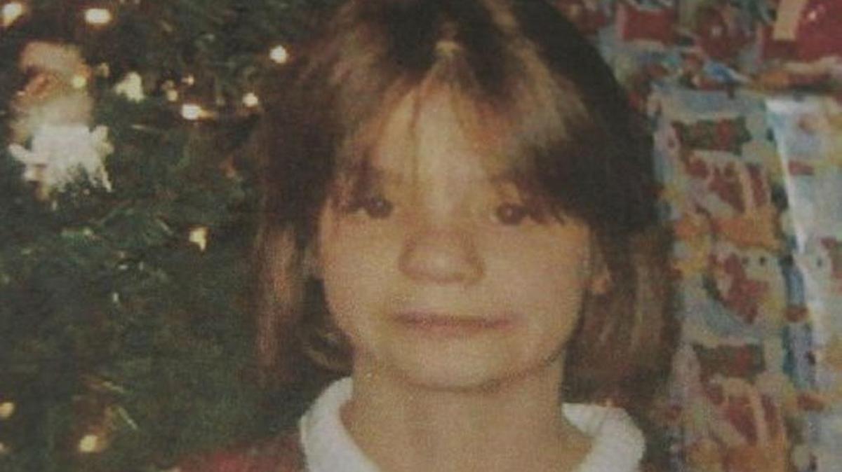 Erica Parsons stares blankly in front of the family Christmas tree in a photo released after she was reported missing in 2013, the exact date unknown. In August, her adoptive father told a detective that he buried the 13-year-old’s body a week before Christmas in 2011.