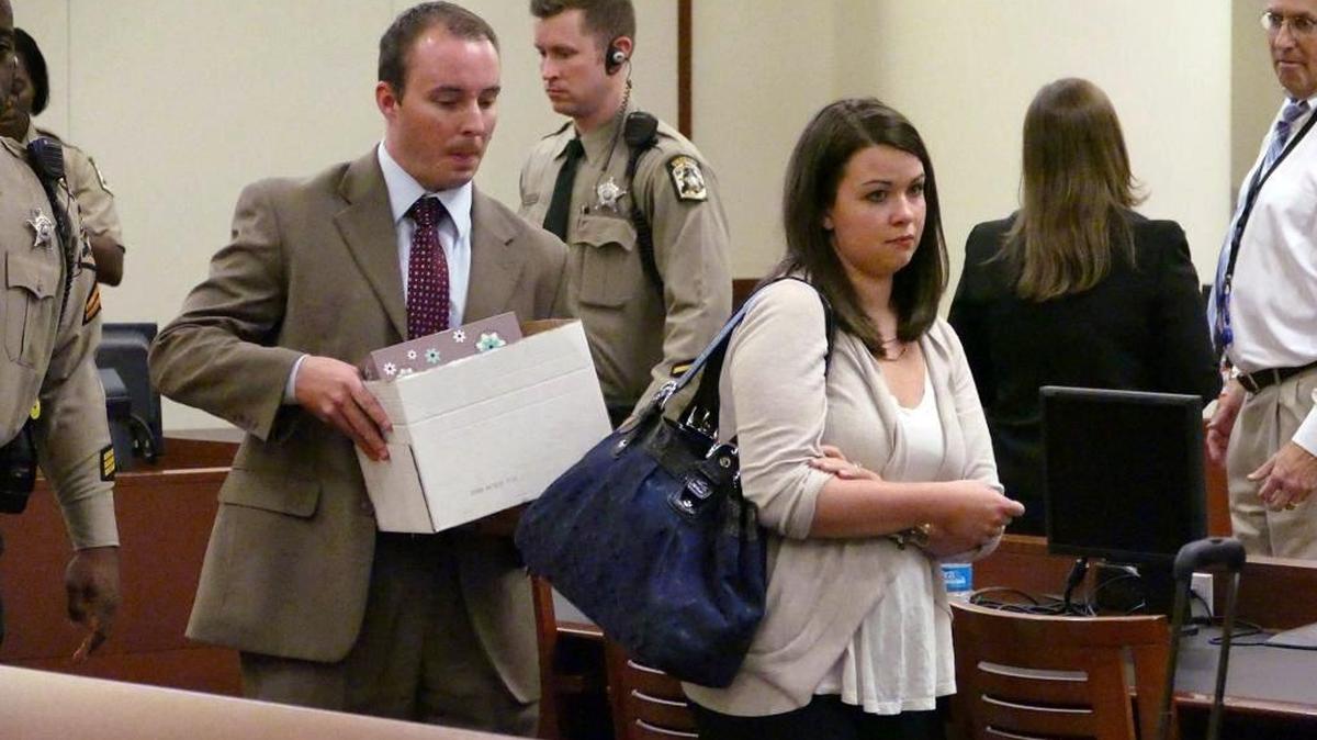 
Randall "Wes" Kerrick and his wife Carrieexit the courtroom after Superior Court Judge Robert Ervin declared a mistrial in the voluntary manslaughter trial of CMPD Officer Randall "Wes” Kerrick in Charlotte, Friday, August 21, 2015. 
