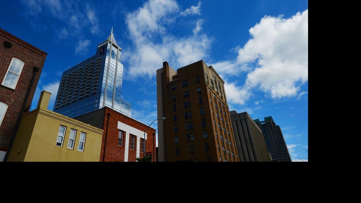 
Raleigh is making new rules for downtown development. The city is setting new height limits for downtown, likely making it easier to build higher without getting council approval. Here the PNC building looms over shorter building nearby on Friday, May 8, 2015.
