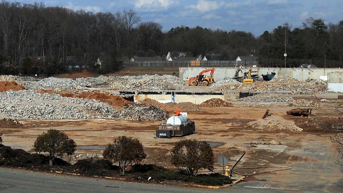 Workers continued to demolish Eastland Mall in east Charlotte Thursday, February 20, 2014. Charlotte hopes to sell 12 acres of the former Eastland Mall site to Charlotte-Mecklenburg Schools next month.