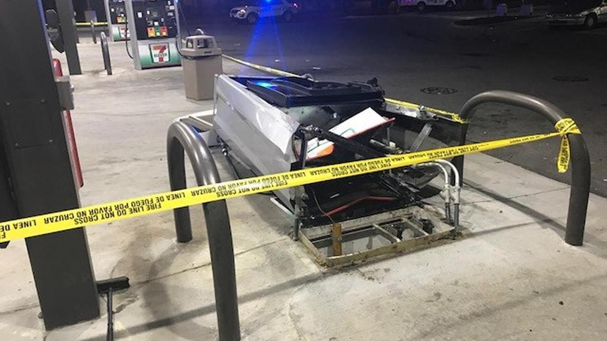 Scene of accident in which gas pumps were struck.