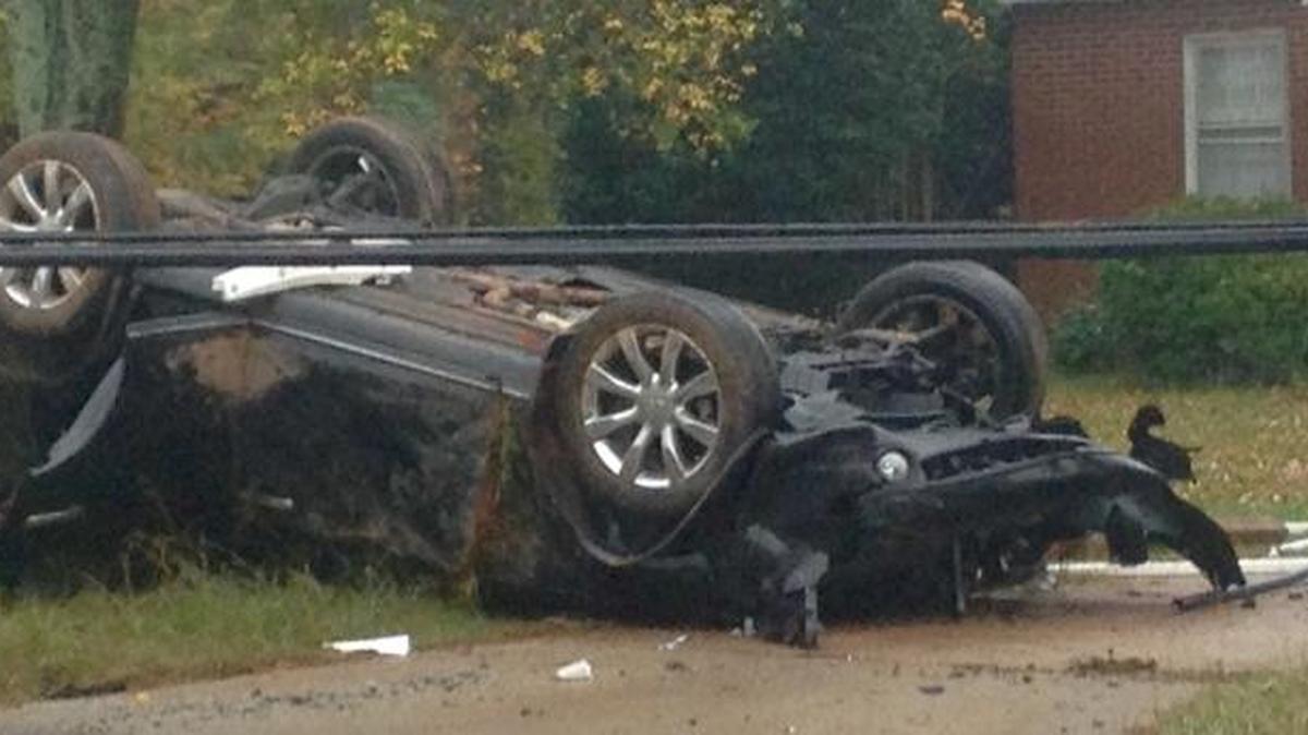A wreck involving an overturned SUV knocked power lines onto Sunset Road, temporarily closing both directions of travel at Peachtree Road on Wednesday morning.