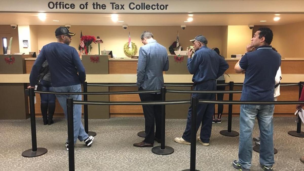 Mecklenburg County taxpayers aren’t able to pay their real estate and personal property taxes online or by phone after hackers crippled county computer systems. Mailed or in-person payments at the Walton Plaza tax office, pictured here, are their only options before the Jan. 5 payment deadline.