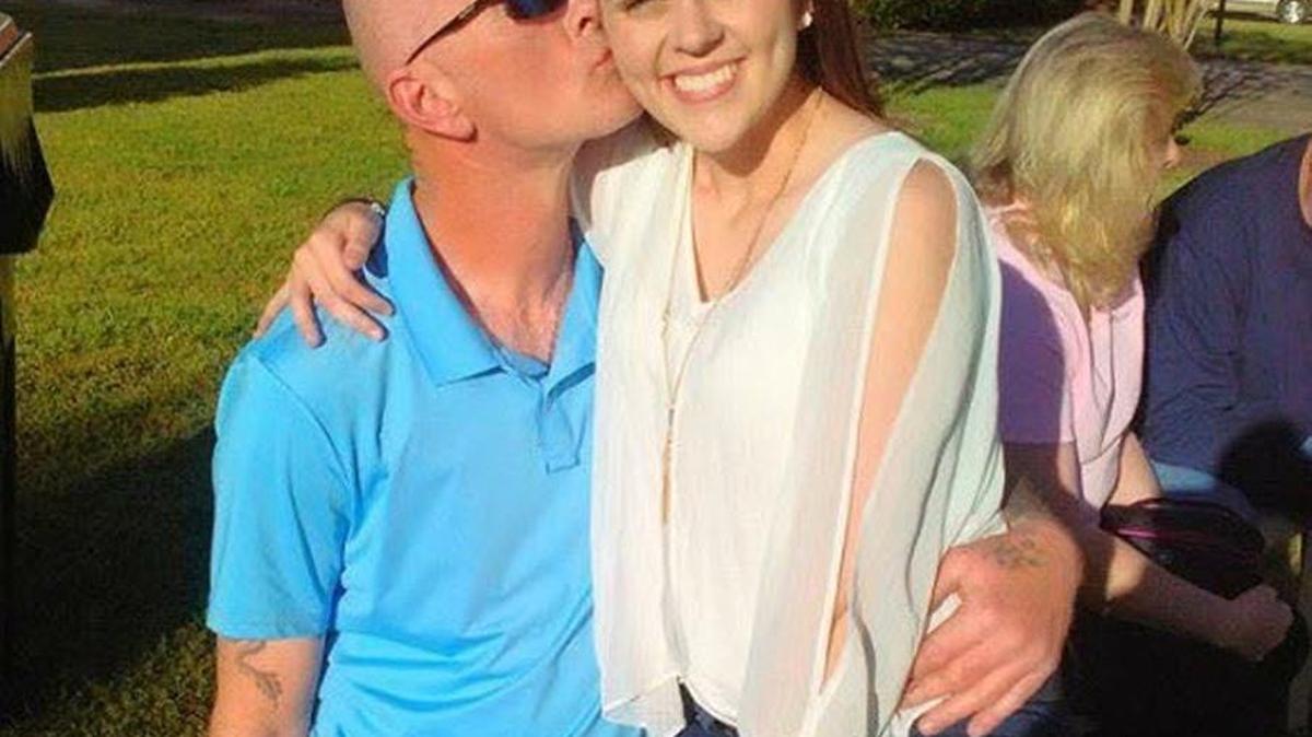 Brooklyn Moseley and her father, Darrell Mosley, celebrate her 16th birthday.