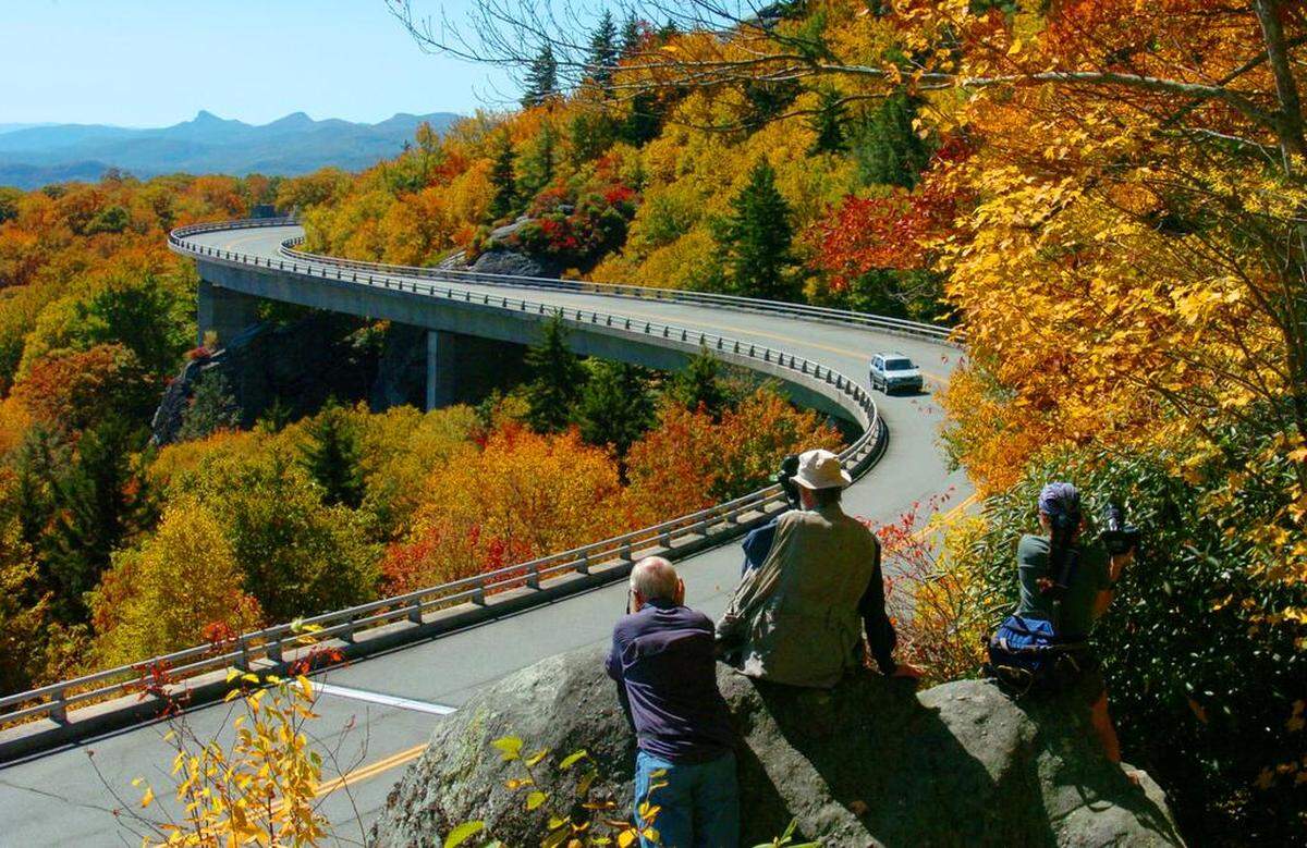 The Linn Cove Viaduct on the Blue Ridge Parkway at Grandfather Mountain. Visitors enjoy mountain views from America’s most-visited national park unit. Be careful of motor vehicle accidents and falls.
