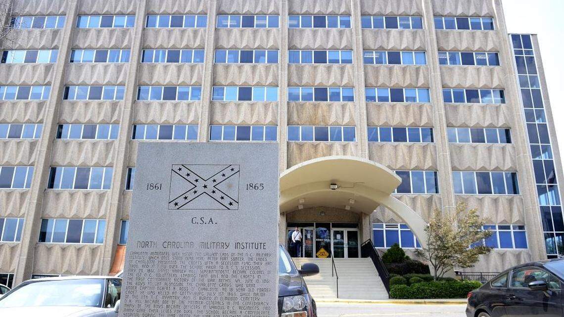 
A stone monument at the Dowd YMCA sits on the East Morehead Street side of the property near the sidewalk. The monument celebrates cadets who attended the North Carolina Military Institute in the late 1850s and early 1860s. During renovations to the Dowd, the YMCA wants to remove the monument, which contains an image of the Confederate battle flag. 
