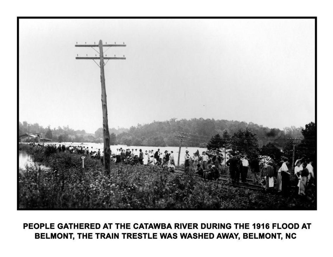 Crowds gather at the Catawba River where the Southern Railway trestle collapsed near Belmont.