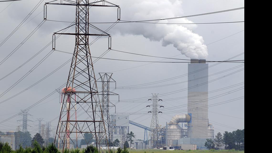 
A cloud of steam rises from the new 365-foot stack at Allen Steam Station near Belmont. Some well owners near the station have been told not to drink or cook with their well water. 
