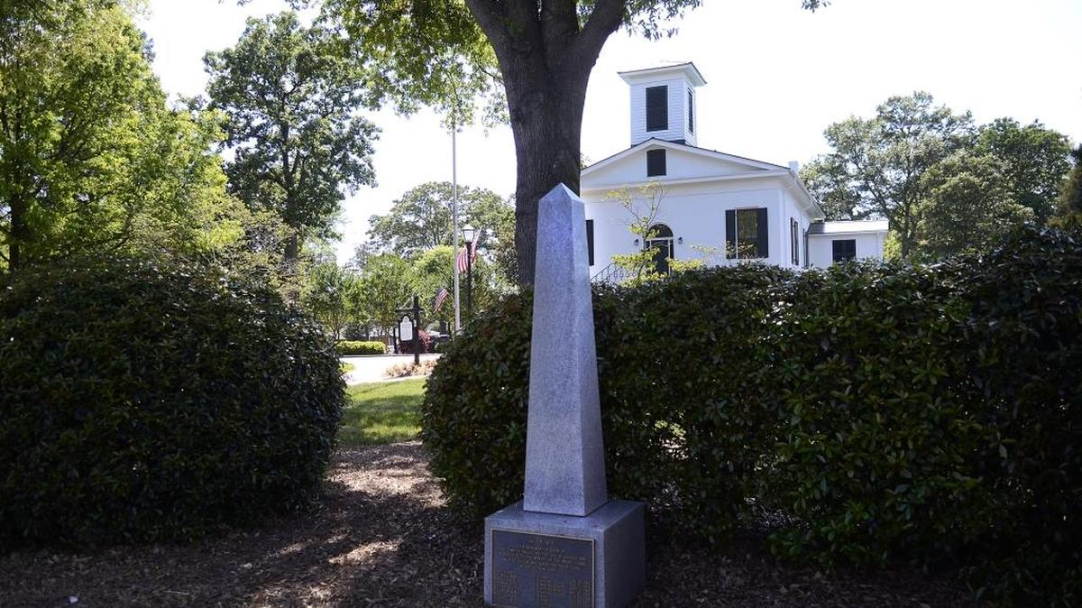 The memorial to nine men from Dallas, N.C. who died in Vietnam stands at the square of the town. .