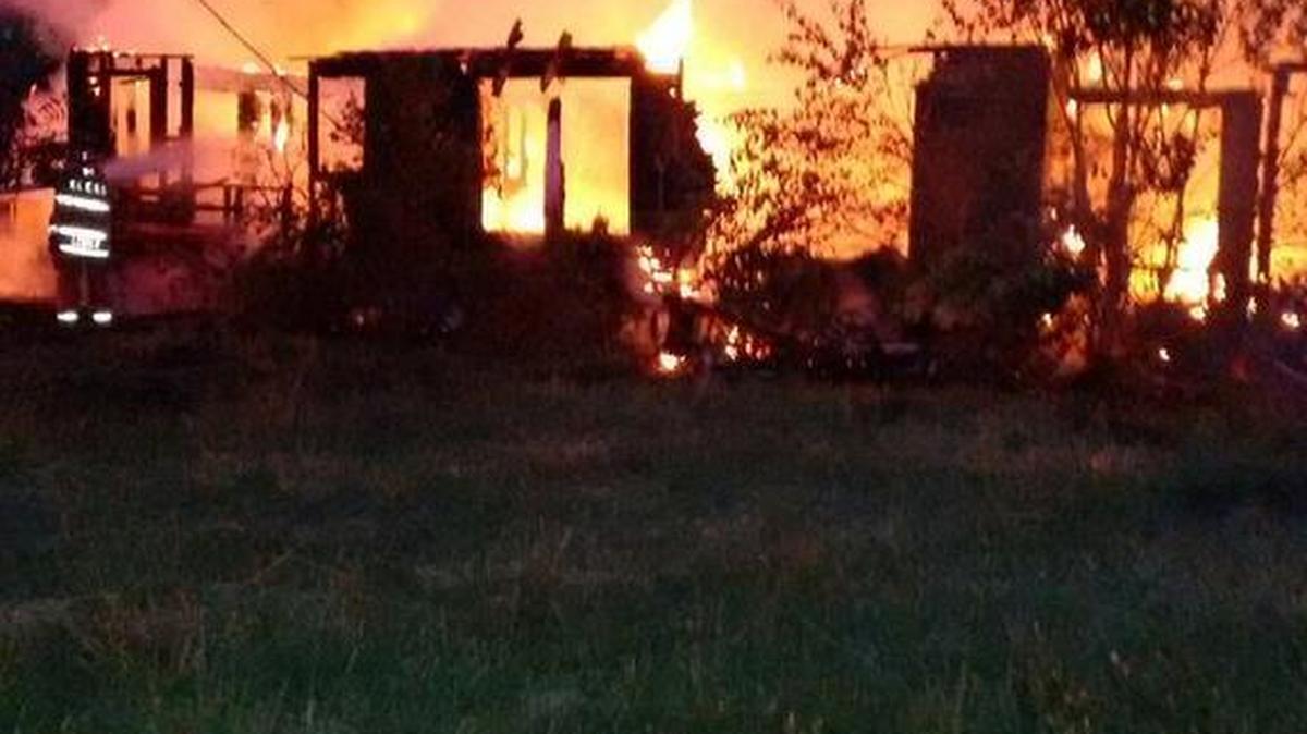 The intersection of CPCC Lane and Campus Ridge Road in Matthews will remain closed until at least 10 a.m. Friday as firefighters remain at a vacant house gutted by an early morning fire, town officials said.
