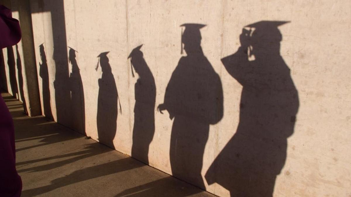 School officials banned a Cabarrus County honor-roll student from graduation ceremonies on Saturday night because she wore an off-the shoulder top to school one day and bristled when the principal ordered her to change it.