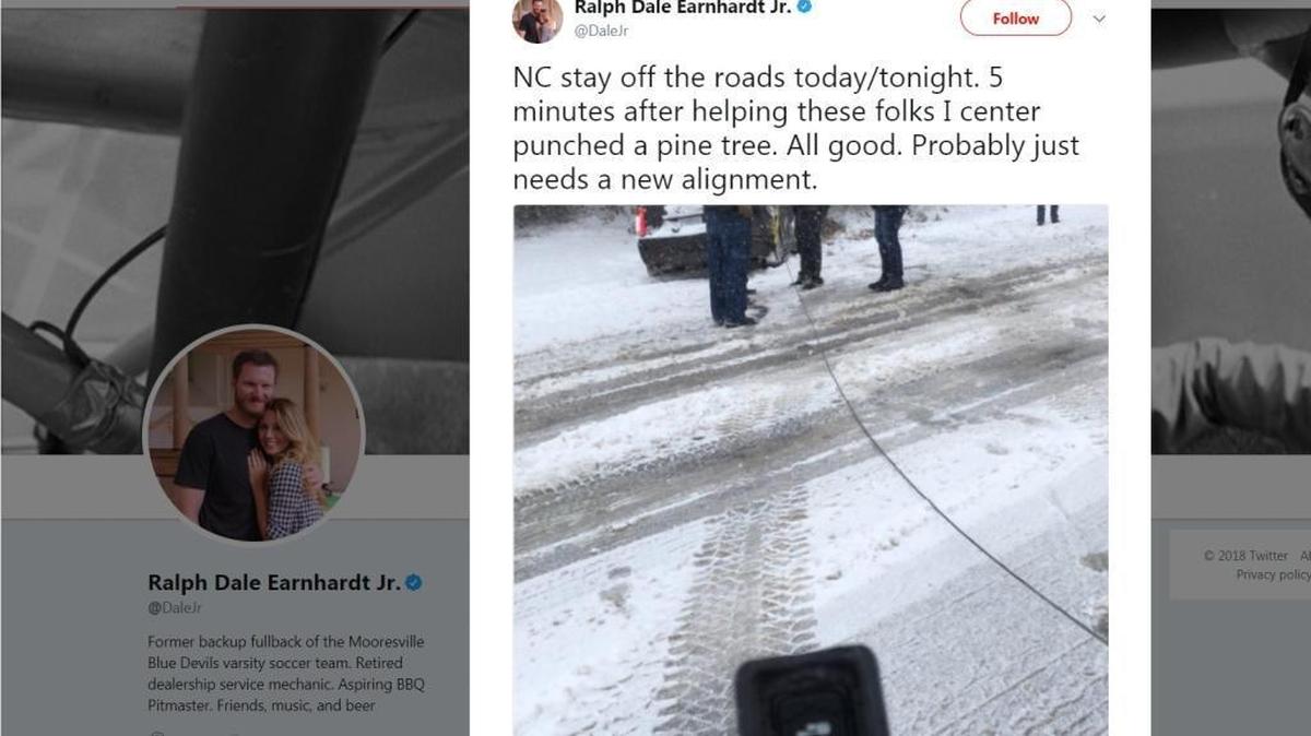 Dale Earnhardt Jr. tweeted Wednesday afternoon he collided with a tree just minutes after helping a family trying to drive through a snow-covered road. He warned NC drivers to stay off the roads during the snow storm.