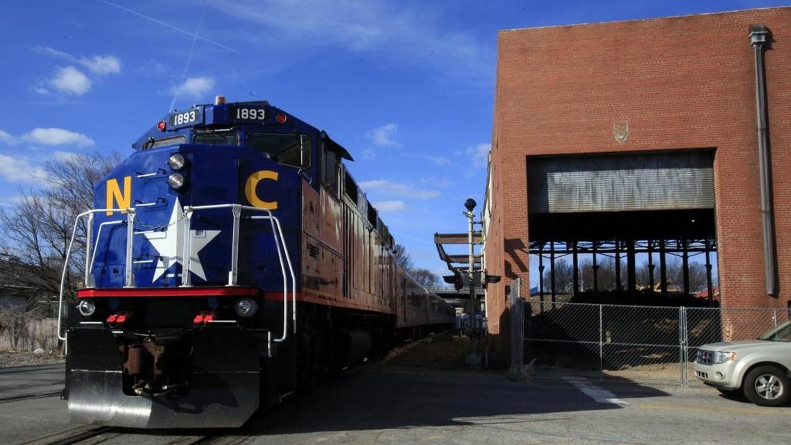 
2013 file photo – An Amtrak train goes through downtown Raleigh
