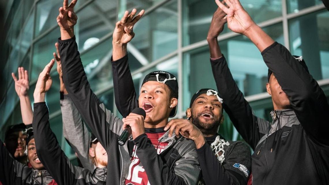 USC's PJ Dozier demands that the crowd throw up four fingers to signify their Final Four spot in the NCAA tournament after their win over Florida.
