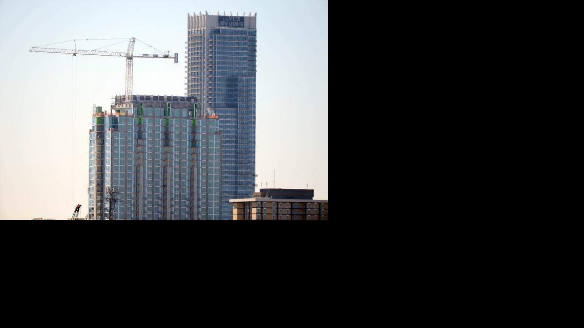 
Construction continues on the 24-story SkyHouse Uptown apartments, left, on Friday in uptown Charlotte. The 50-story VUE, at right, is billed as the tallest high-rise between New York and Miami. As a new wave of apartments comes up in Charlotte, firefighters say they’re preparing to contend with fires in the new buildings.
