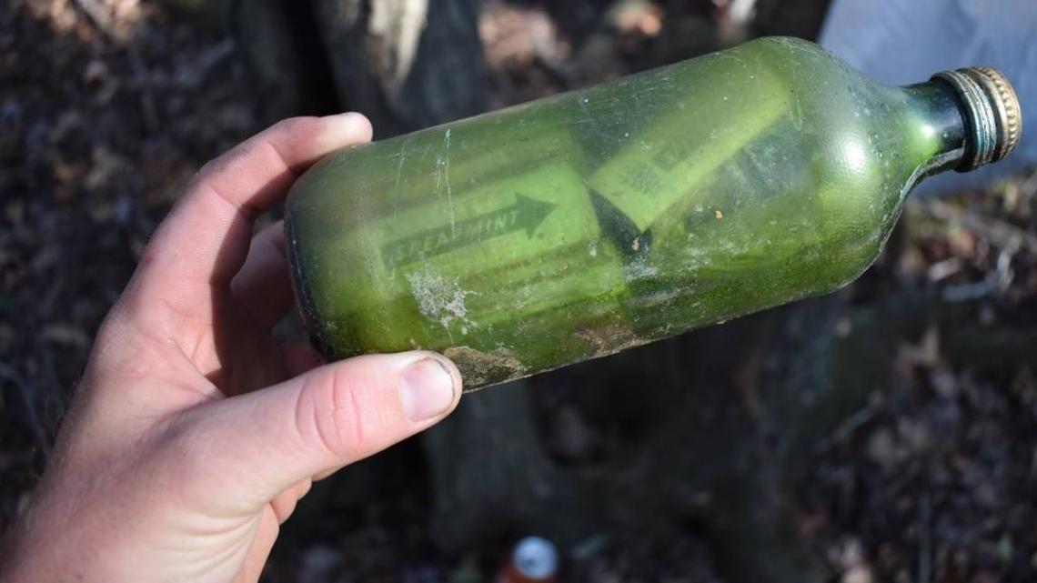 The message was stuffed into the 7-Up bottle with chewing gum and beads.