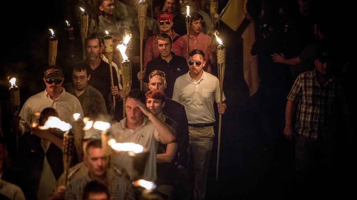 Chanting "White lives matter!"You will not replace us!" and "Jews will not replace us!" several hundred protesters carrying torches marched in a parade through the University of Virginia campus in August.