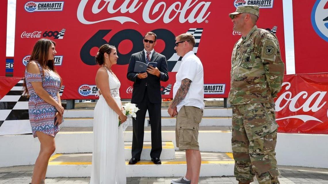 The wedding ceremony of retired Army Staff Sergeant Jay Lapan and Lindsay Coppolla from Southington, Connecticut at the Charlotte Motor Speedway.