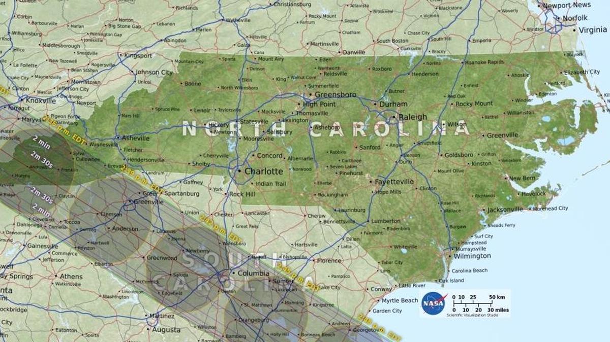 Partly sunny skies with a chance of showers and thunderstorms are expected Monday when a total solar eclipse will be visible in the Carolinas.