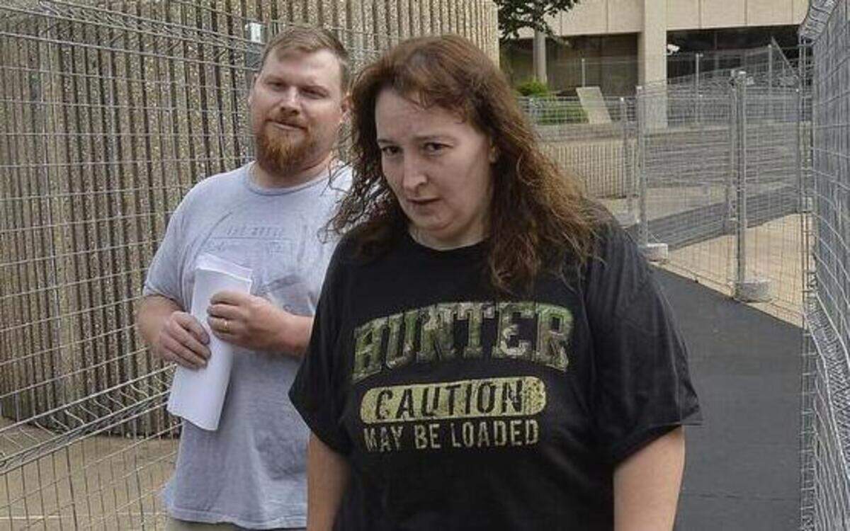 
From left, Sandy and Casey Parsons leave the federal courthouse in Winston-Salem after they were arrested on federal charges on July 28, 2014.
