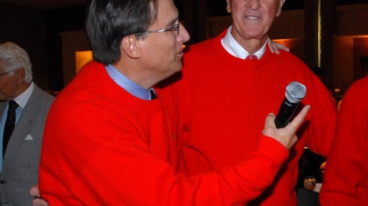 This 2007 photo shows then-Mayor Pat McCrory, left, and Graeme Keith at the Good Fellows Club holiday lunch, which raises money for families in need. Keith and McCrory have been friends for years.