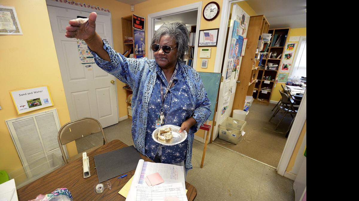 
Marjetter Crooms founder of the Neighborhood Family Resource Center prepare the classroom for kids to arrive after the school bus drop them off in the neighborhood. Family Resource Center is a small non-profit that helps African-American and immigrant kids with after school lessons living in the economically challenged community of Wingate and Ponderosa is in need of money to renovate the donated building where it stages after school tutoring and summer day camp programs.
