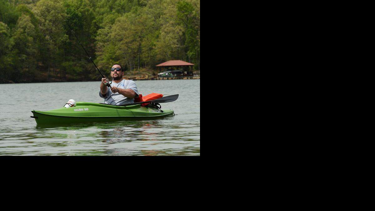 
Robert Stowe of Belmont fishes from his kayak for bass and crappie on the Catawba River in Belmont on Sunday, April 12, 2015. “I love this beautiful weather; it’s peaceful fishing from my kayak,” Stowe said, while enjoying the warm sunny weather on the river.
