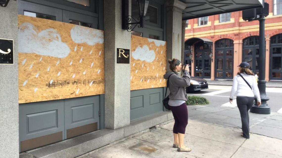 With eerie calm, Charleston hunkers down in face of historic storm