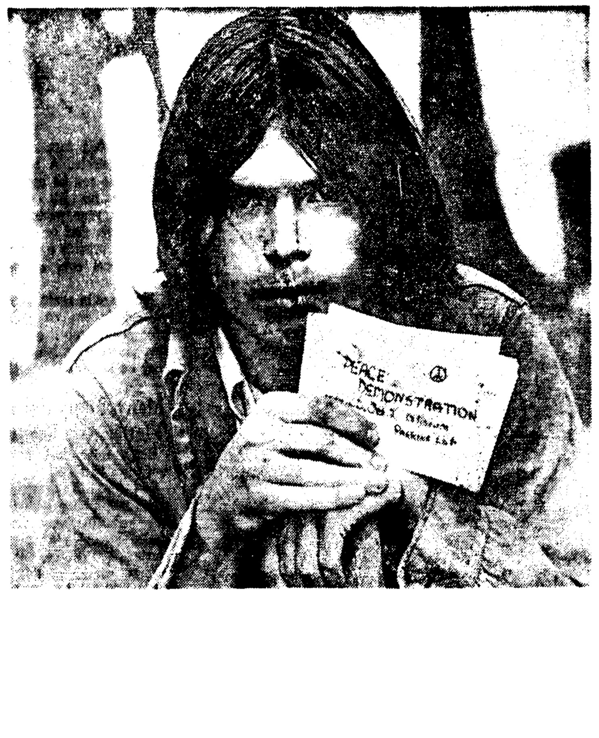 Mac Hayes in tattered Army shirt passes out invitations to join a peace demonstration. October, 1968.