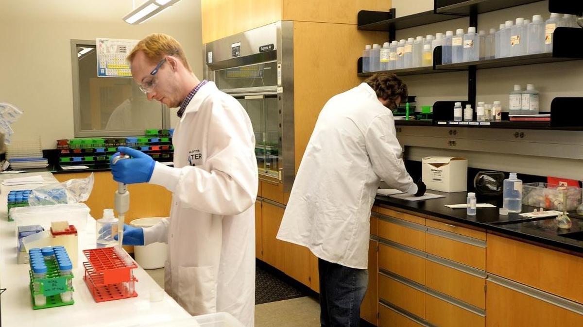 Technicians test water samples at Charlotte Water's Environmental Services Facility in January.