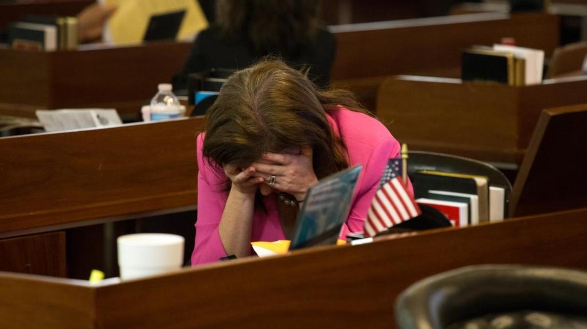 
Rep. Tricia Cotham, D-Mecklenburg, takes a moment during a pause in action on the House floor at 12:45 a.m. on Wednesday, Sept. 30, 2015. The House began its work day – the final one of the 2015 session – at 11 a.m. on Tuesday.

