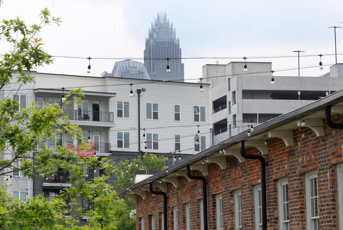 Uptown Charlotte buildings can be seen from Optimist Hall.