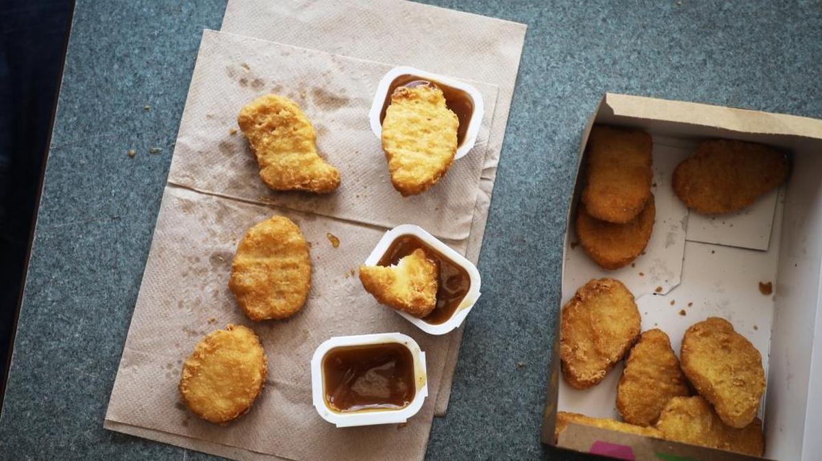 Mort Hurst, 68, eats 100 chicken McNuggets at the McDonald's in Robersonville, NC on Wednesday, August 30, 2017.