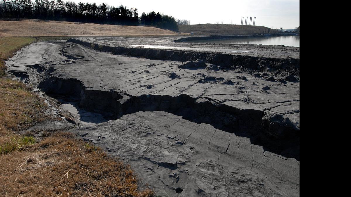 
Coal ash is shown in settling ponds at Duke Energy's Riverbend power plant on Mountain Island Lake in a 2008 photo. 
