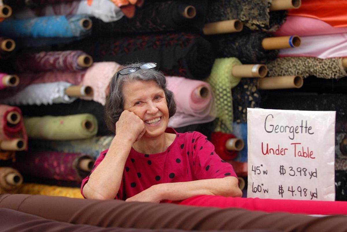 Mary Jo Cloninger, seen here in this 2008 file photo, started her store with a few bits of cloth and a $500 loan from her dad.