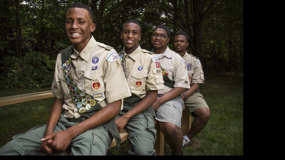 
Eagle Scouts, from left, James Carter, Desmond Woodburn, T.J. Johnson and Keon Regisford of Troop 67 are the first Eagles the troop has had in more than 60 years. The troop was chartered at Ebenezer Baptist Church in 1931.
