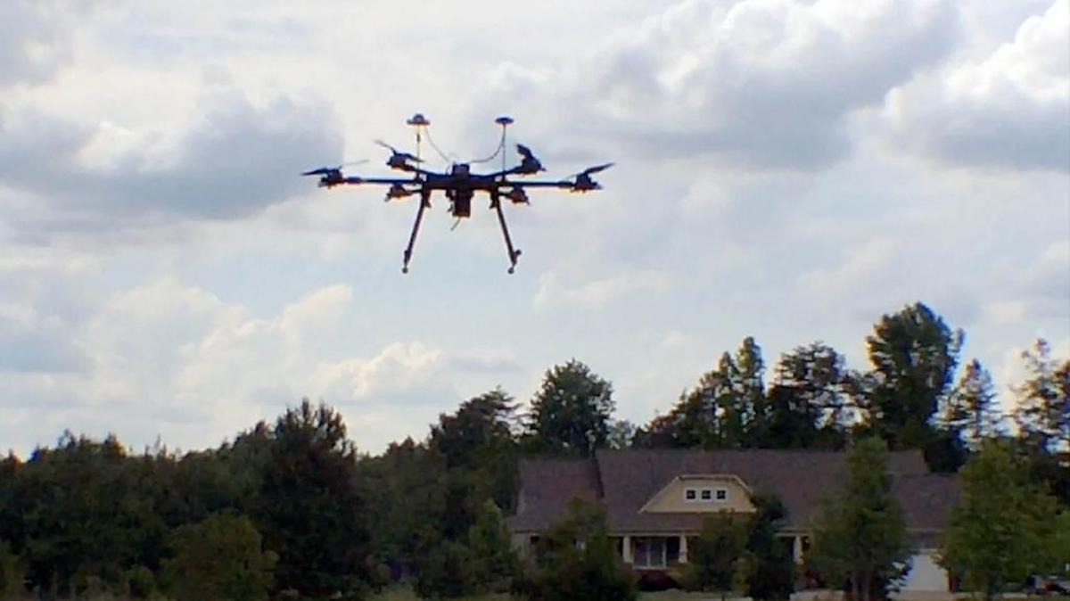 A custom-built drone hovers near Charlotte.