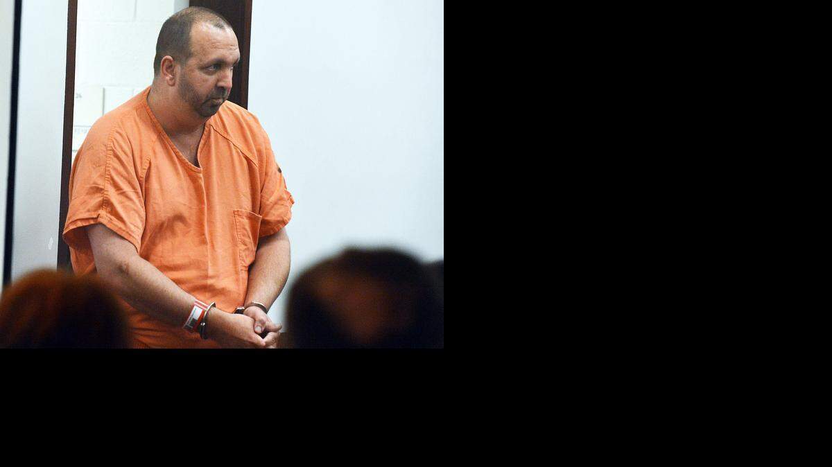 
Craig Stephen Hicks, 46, enters the courtroom for his first appearance Wednesday, Feb. 11, 2015, at the Durham County Detention Center. He is accused of shooting his Finley Forest neighbors, Deah Shaddy Barakat, 23, and his wife, Yusor Abu-Salha, 21, and Abu-Salha’s sister, Razan Abu-Salha, 19, of Raleigh. 
