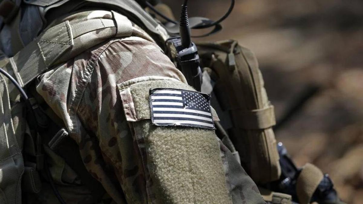 A United States flag patch adorns the uniform of a paratrooper during a training exercise at Fort Bragg earlier this year.